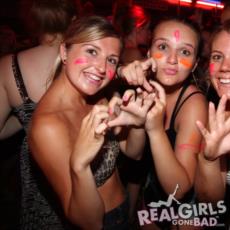 Cute girls with face paint, getting rather drunk