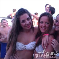 Smiling party girls in bikinis