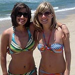 Two Girls in Bikinis on a Beach