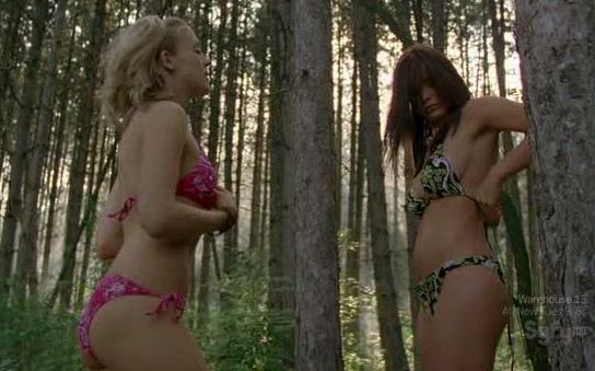 Fastening their bikinis Kacey Barnfield and Angelica Penn
