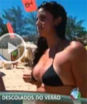 A Cute Brunette Swaps her Bikini on the Beach in Brazil