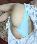 Spying Upskirt as she lies on the Sofa