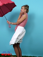 It's amazing that her umbrella stays the right way round, but her skirt won't