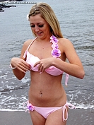 Lauren is thinking of removing her bikini top