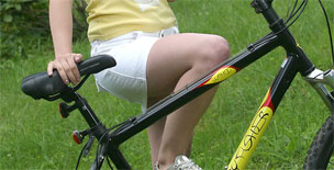 19yo in Short Skirt getting on a Bicycle - Non Nude