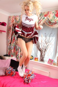Cheerleader Flyskirt While Jumping on her Bed