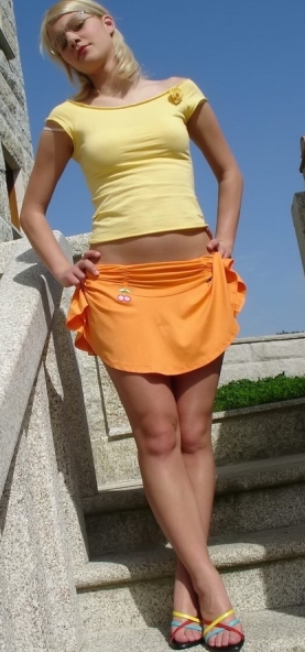 Lizzy in a Short Orange Skirt