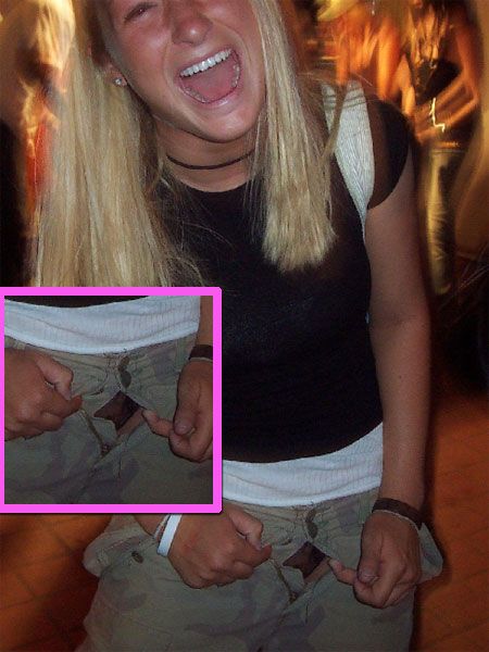 Laughing Blonde Girl with her jeans unzipped