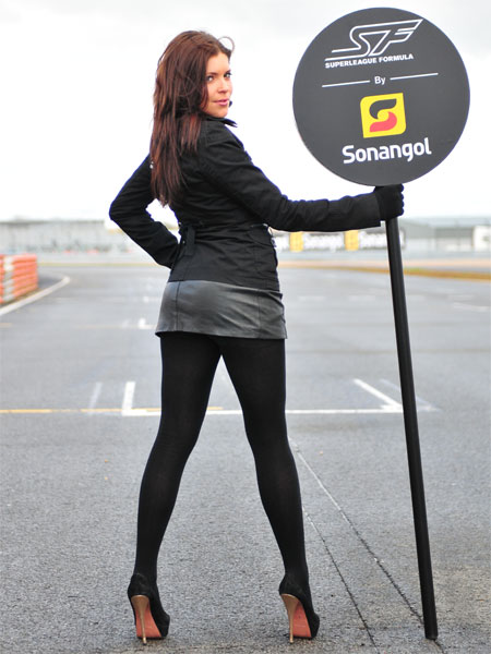 Hot Brunette wearing Black Tights and High Heels