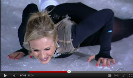 Elisabeth Laughs as she falls flat on the ice