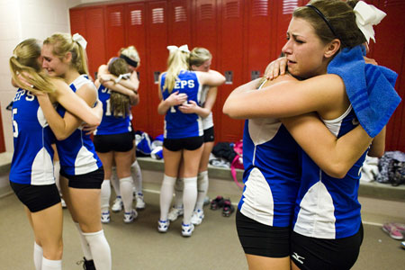 Hugging Volleyball Players in the Locker Room