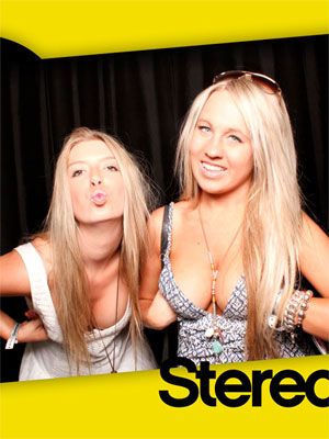 Blondes Showing Cleavage in a Photobooth