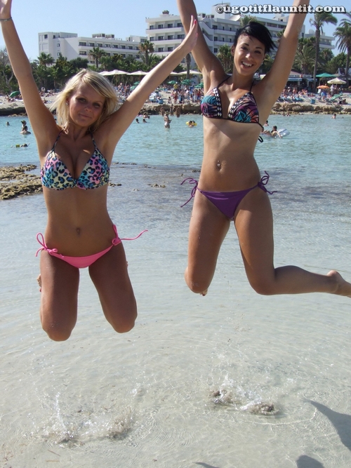 Two Girls Jumping in their Bikinis