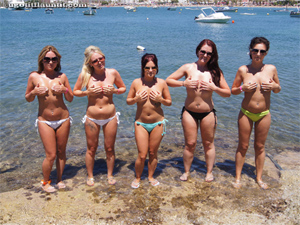A group of girls from London give the cameras some handbra fun