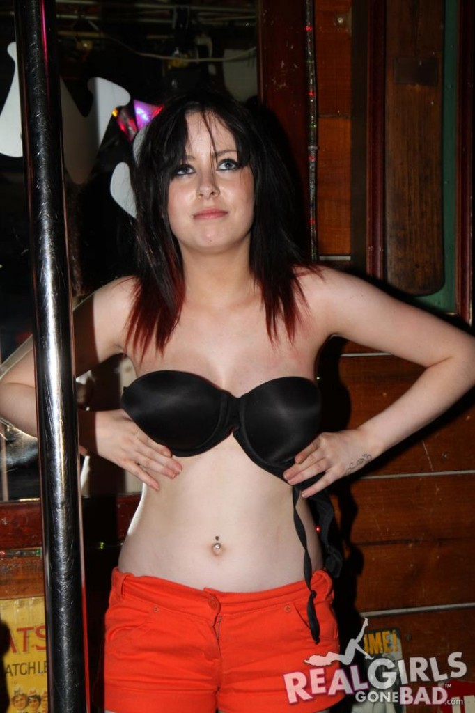 Girl taking her bra off on a crazy alcohol-fueled pub crawl