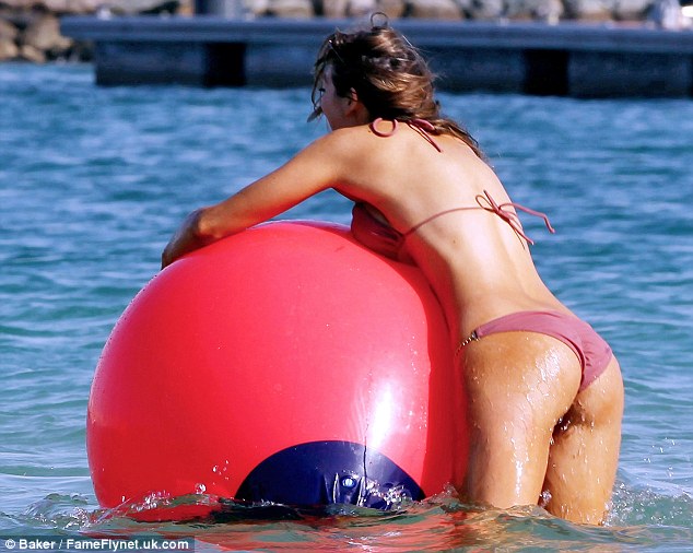 Luisa is enjoying a huge inflatable ball