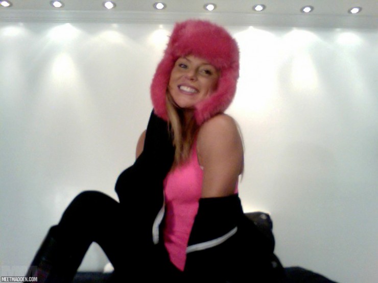 Madden is wearing a warm pink hat