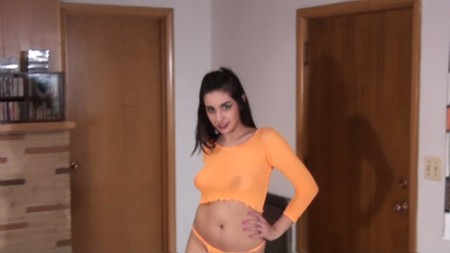 Model Alisha poses in orange for Northwest Beauties
