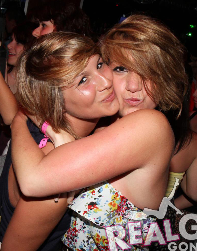 Drunk party girls hug