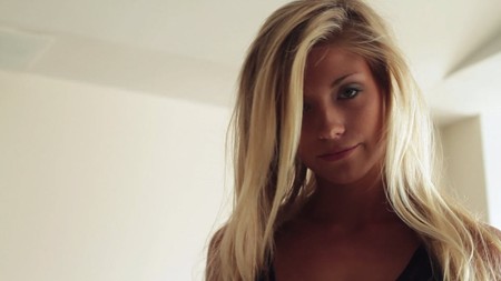 Cute blonde model poses