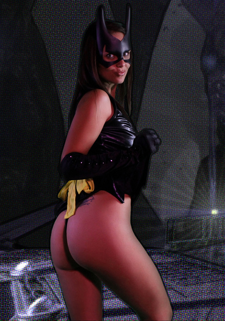 Batgirl shows off her hot ass in the Batcave