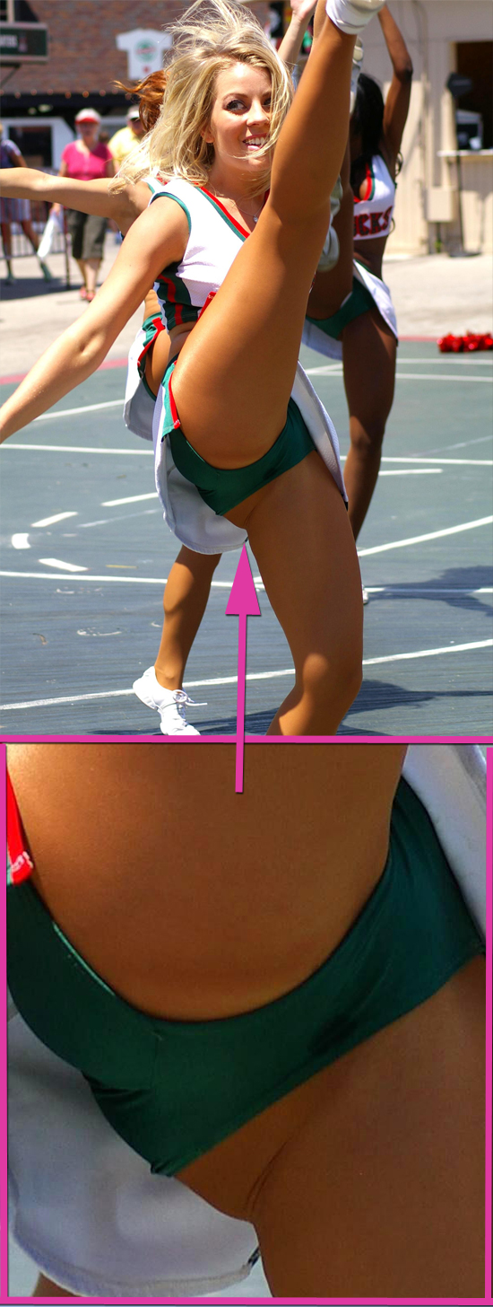 A cute blonde cheerleader kicks high to reveal her green panties in public