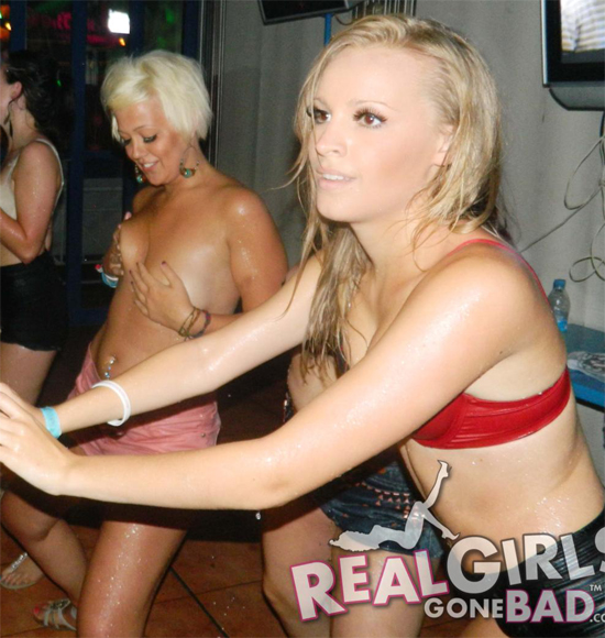 Party girls strip off on stage