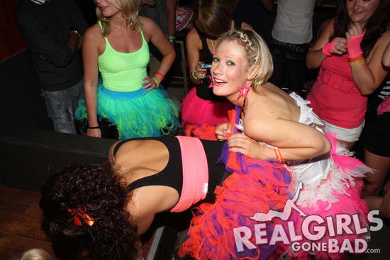 Drunk party girls having fun in public on a hen night