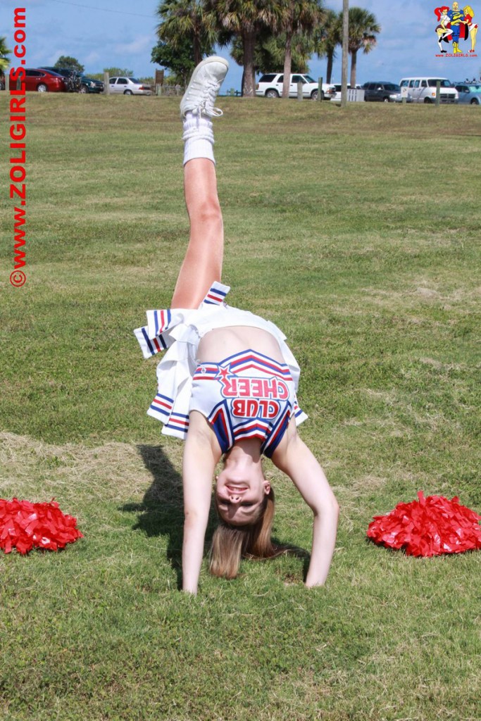 Cheerleader practicing in the park