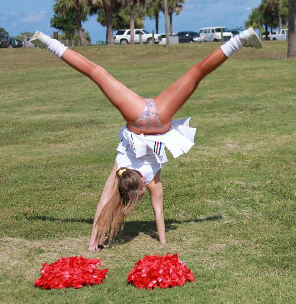 Cheerleader upskirt as she does a cartwheel