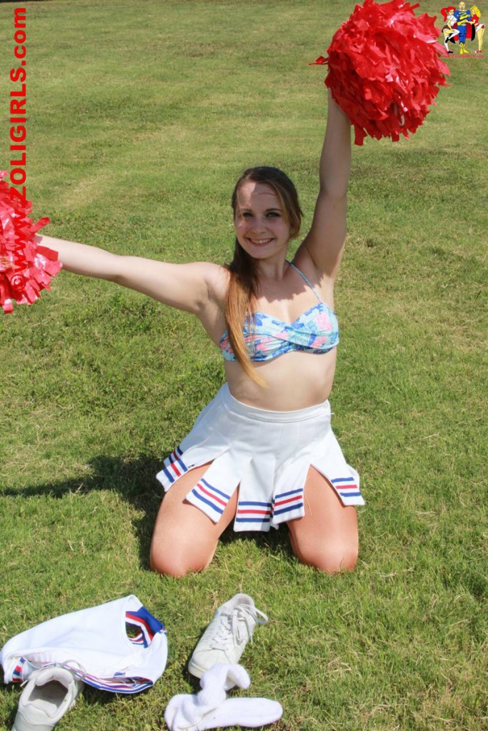 Cheerleader strips to her underwear