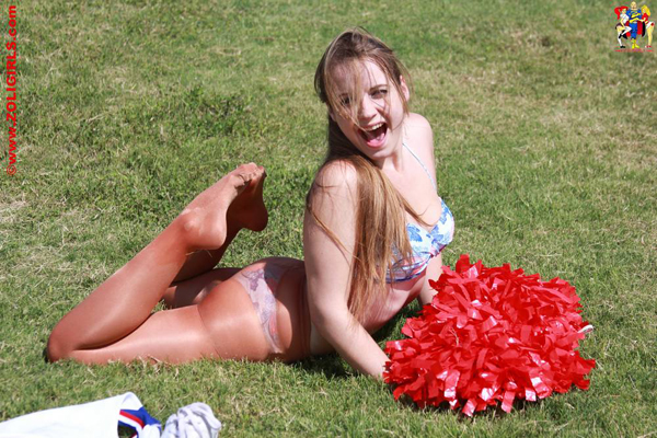 Cheerleader Angelica showing her underwear in the park