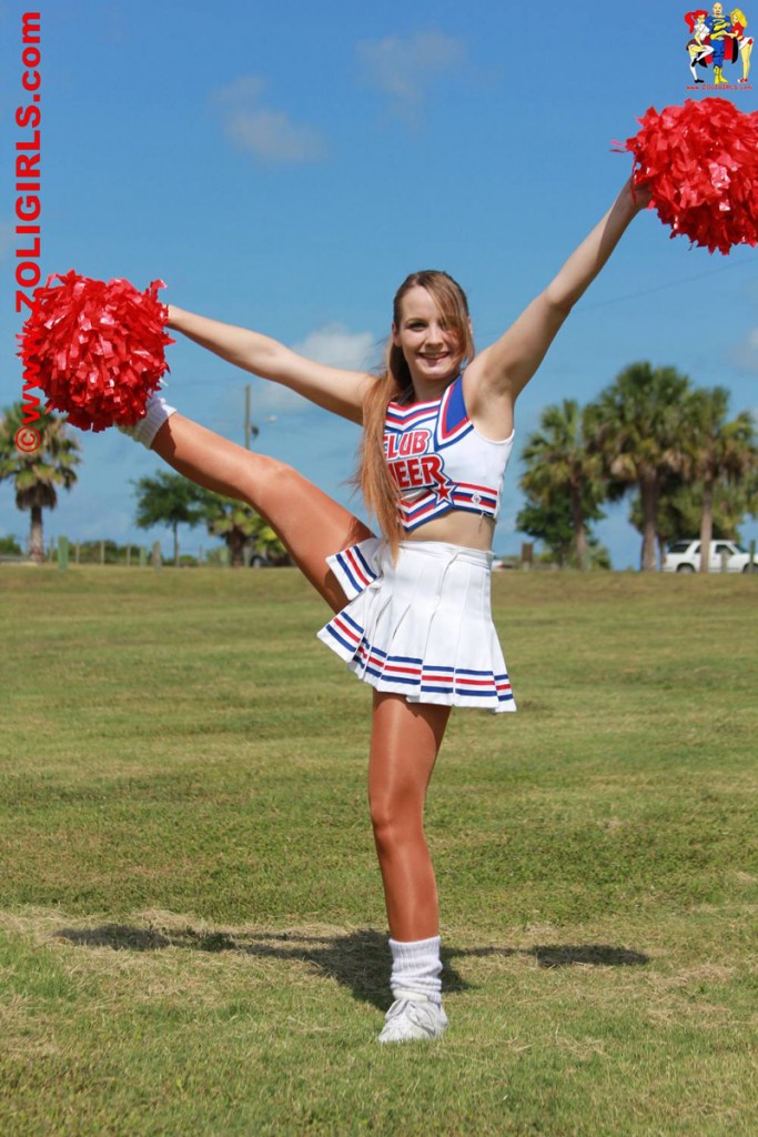 Kicking Cheerleader with Pom-Poms
