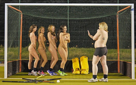 Four UK coeds naked and covering for a sports charity calendar