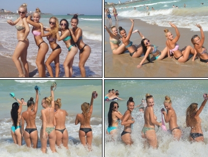 Girls strip off their bikini tops on the beach