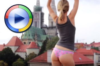 Trying on panties on a rooftop