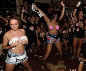 British girls strip topless during a sexy competition in a bar