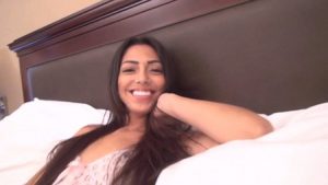 Northwest Beauties hottie Annie smiling on her bed