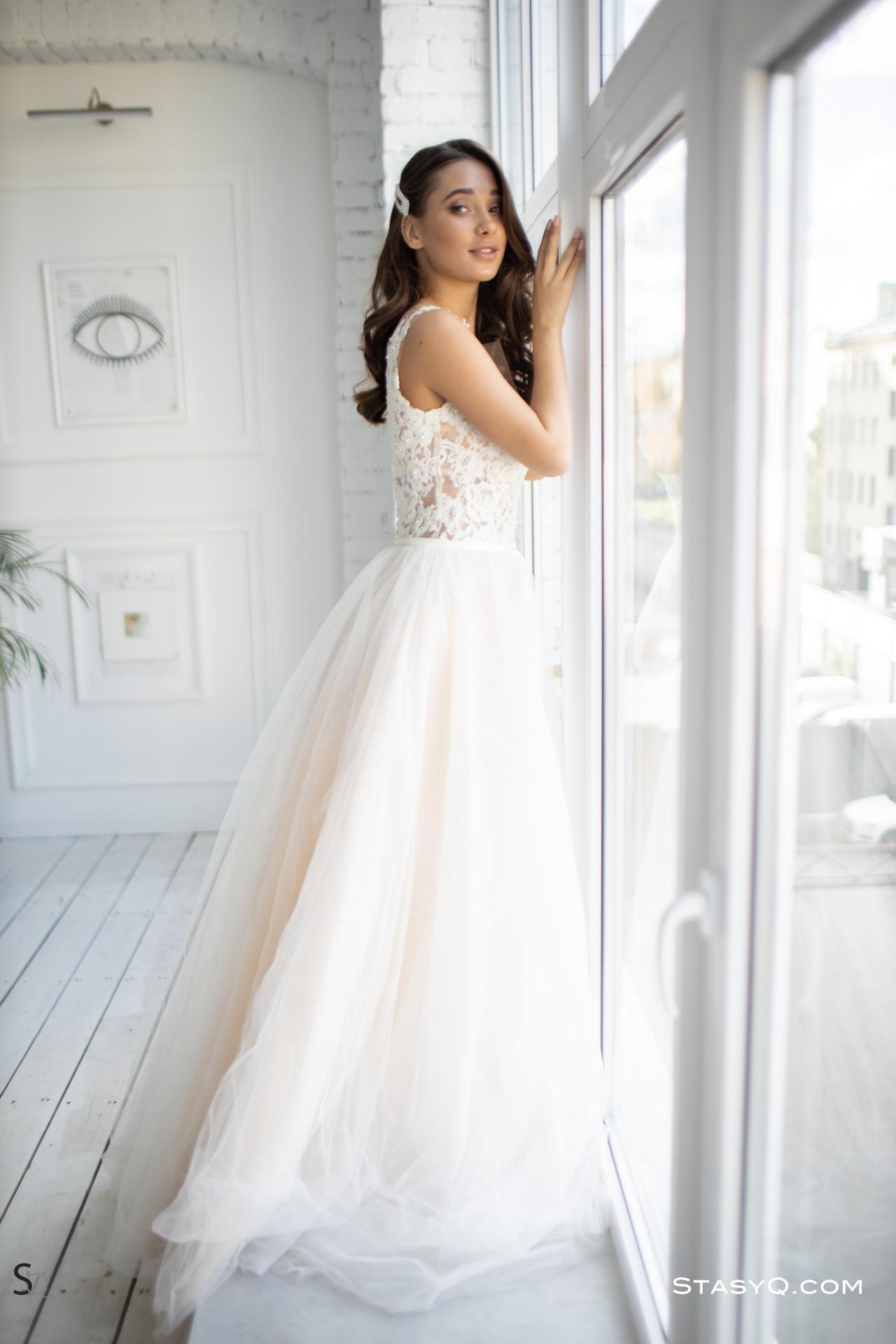 MedinaQ in her wedding dress