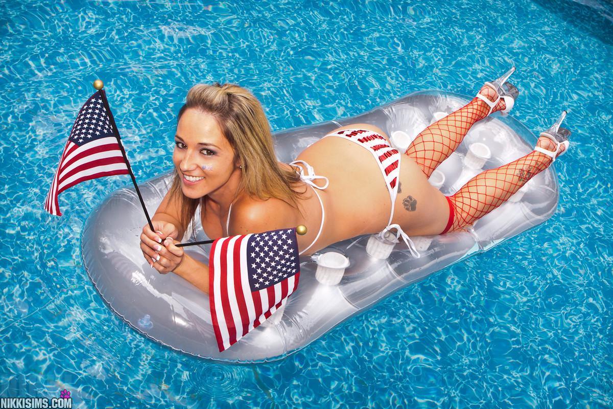 Sexy girl nextdoor having fun on an inflatable with her sexy ass pushed out