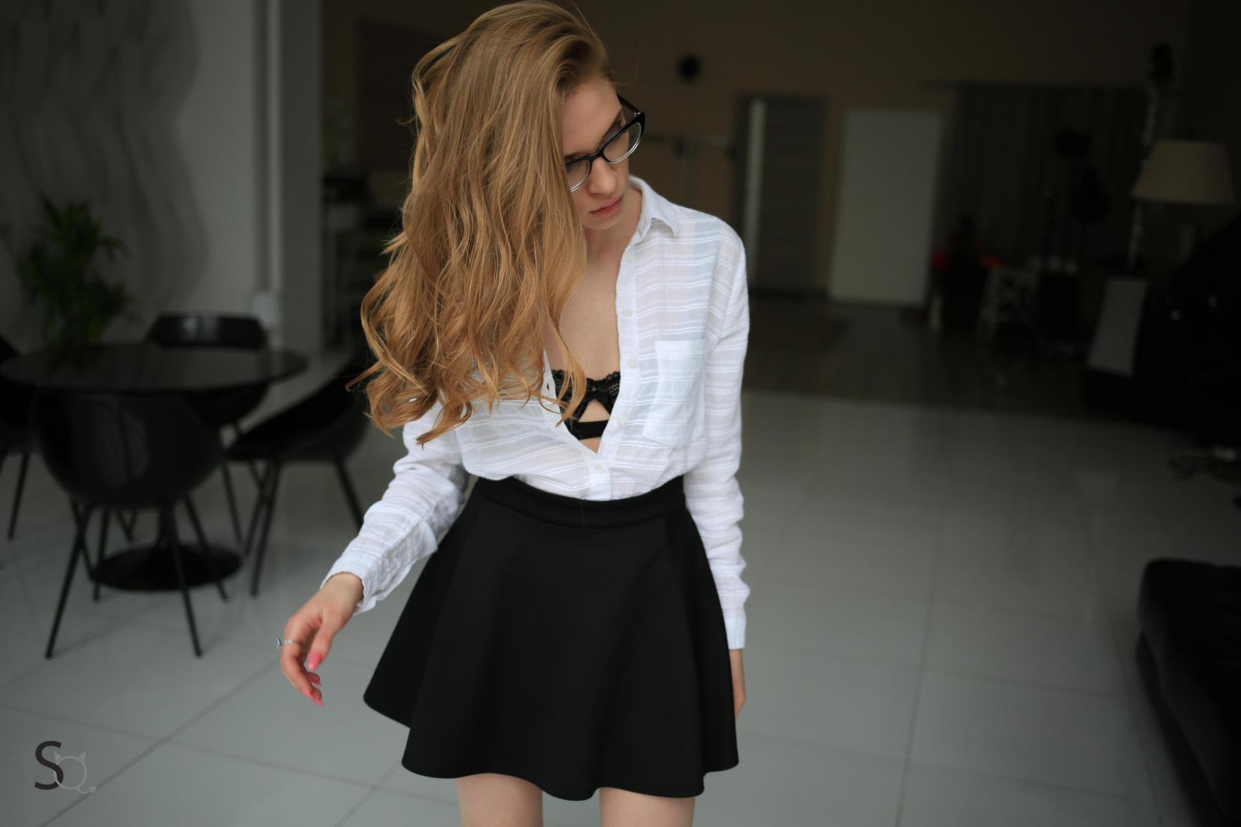 She opens her blouse for a sexy downblouse shot of her black bra for StasyQ