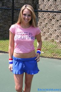 Brooke Marks getting ready for tennis practice in her sexy pink top and blue mini skirt