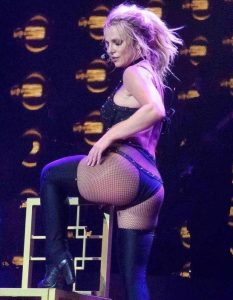 Britney Spears in pantyhose performing on stage