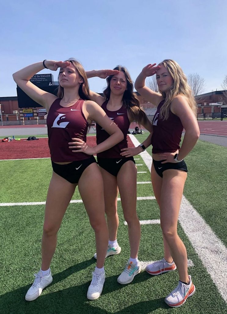 Three track coeds in their black panties