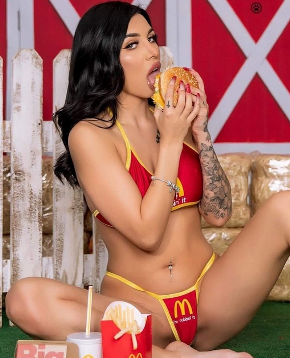 Bikini babe eats a burger