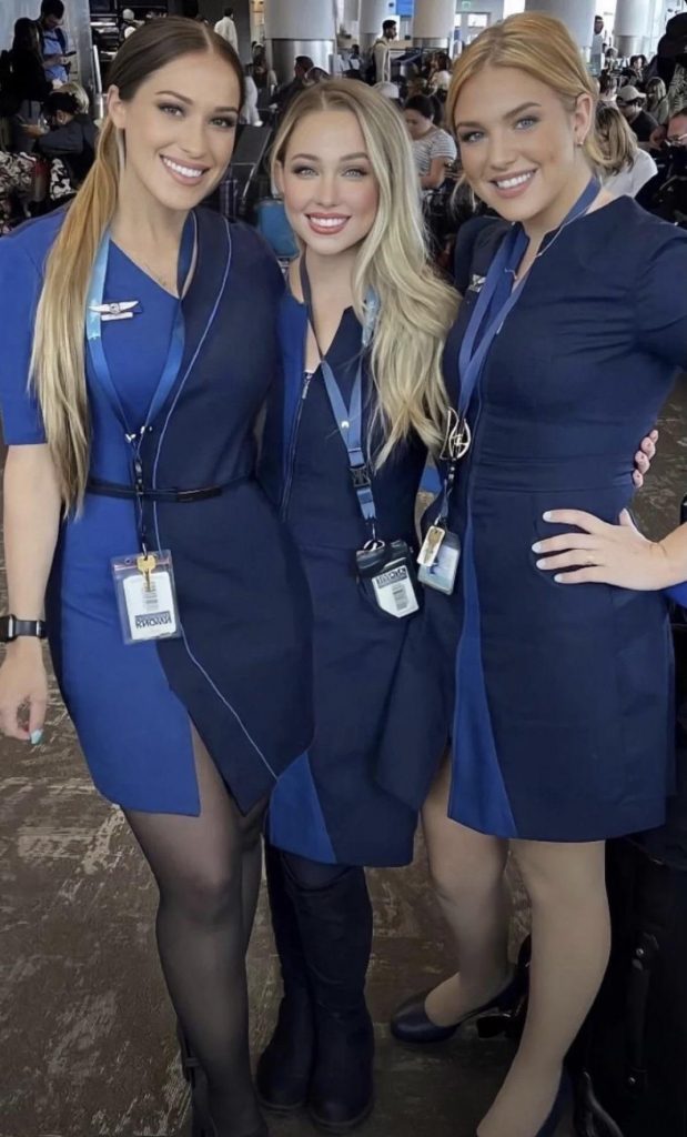 Four beautiful air hostesses