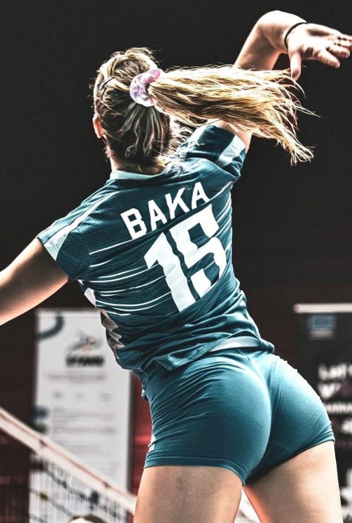 Volleyball player in tight green shorts with VPL